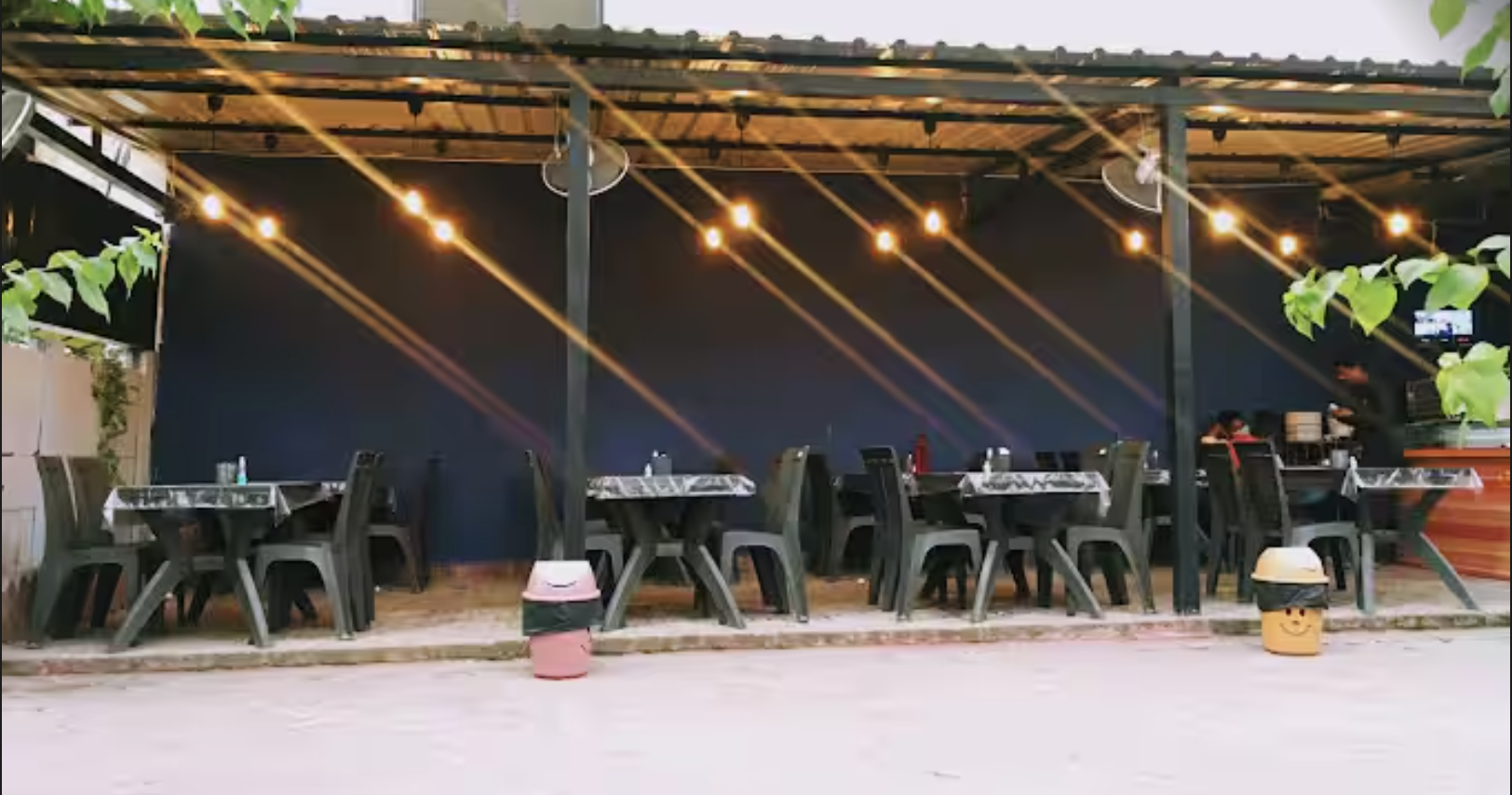 Open-air seating with string lights